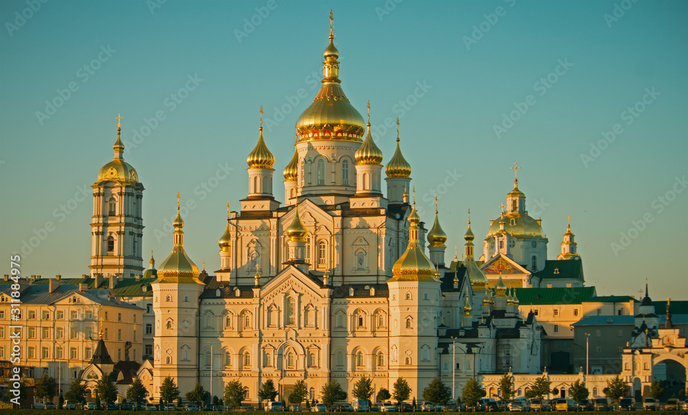 Aerial view of Pochaev Monastery, Orthodox Church, Pochayiv Lavra in the morning. View from the hills, Ukraine