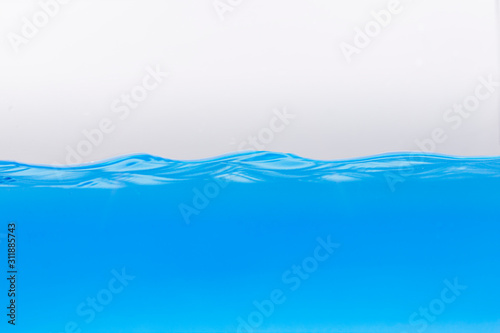 Nice abstract blue water splash on white background © phadsanu