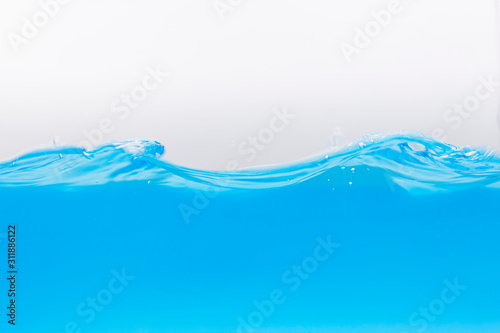 Nice abstract blue water splash on white background