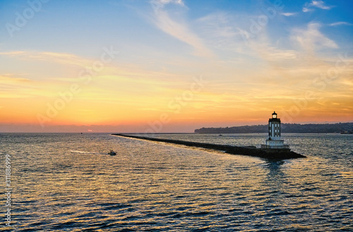 Los Angeles Harbor LIghthouse at Sunset with Fishing Boat