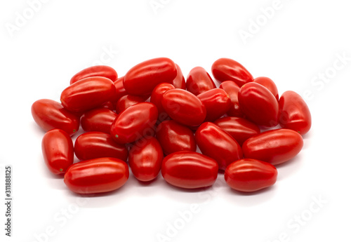 Photography Lots of red elongated cherry tomatoes on a white background