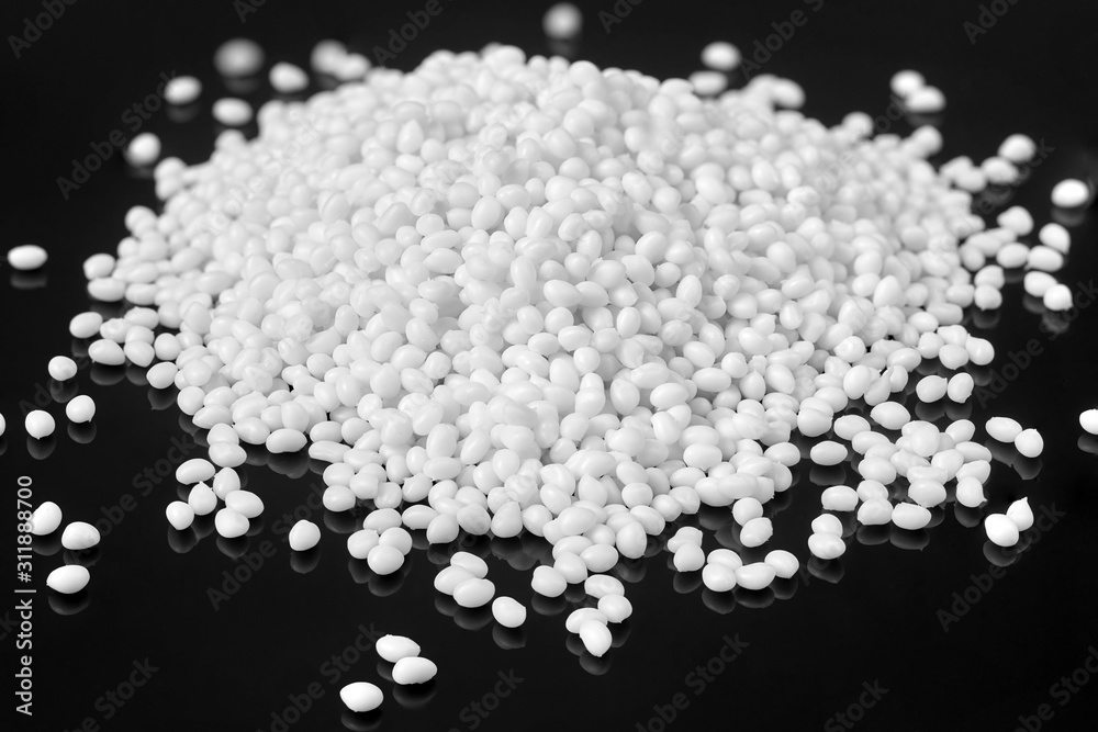 Closeup of a large slide of white plastic polymer Closeup of a large slide of white plastic polymer