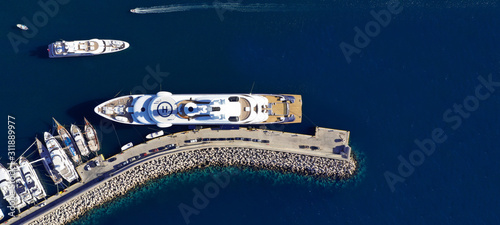 Aerial drone top down ultra wide photo of Mediterranean port with yachts docked photo