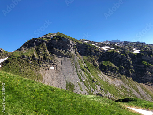 Lachenstock Mountain above the valley Wagital and alpine Lake Wagitalersee (Waegitalersee), Innerthal - Canton of Schwyz, Switzerland photo