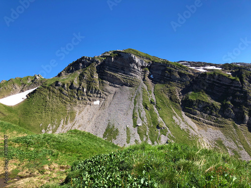 Lachenstock Mountain above the valley Wagital and alpine Lake Wagitalersee (Waegitalersee), Innerthal - Canton of Schwyz, Switzerland photo