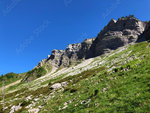 Lachenstock Mountain above the valley Wagital and alpine Lake Wagitalersee (Waegitalersee), Innerthal - Canton of Schwyz, Switzerland photo