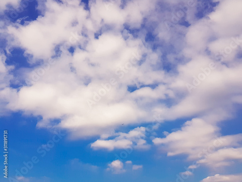 Natural pattern of blue sky and white clouds.