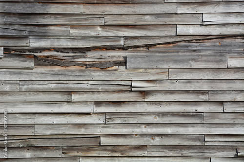 Weathered wood siding on an abandoned rural general store