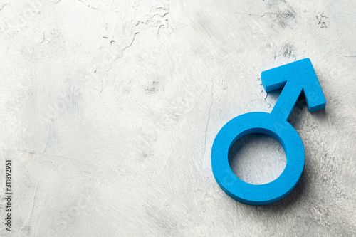 Gender symbols of a man in blue on a gray background