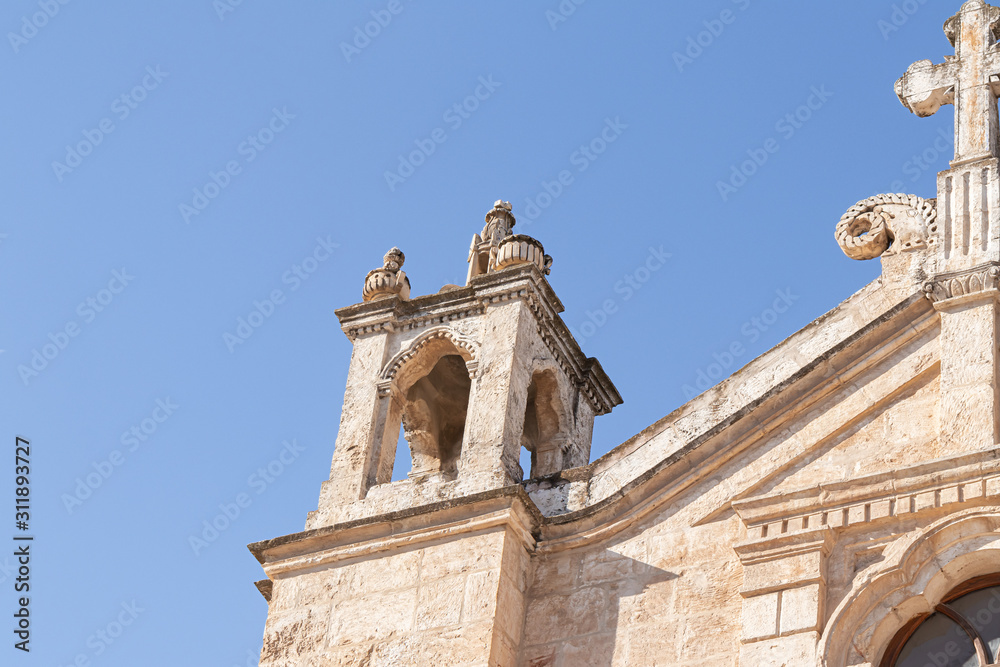 The upper part of the St. Nicholas church bell tower in Bay Jala - a suburb of Bethlehem in Palestine