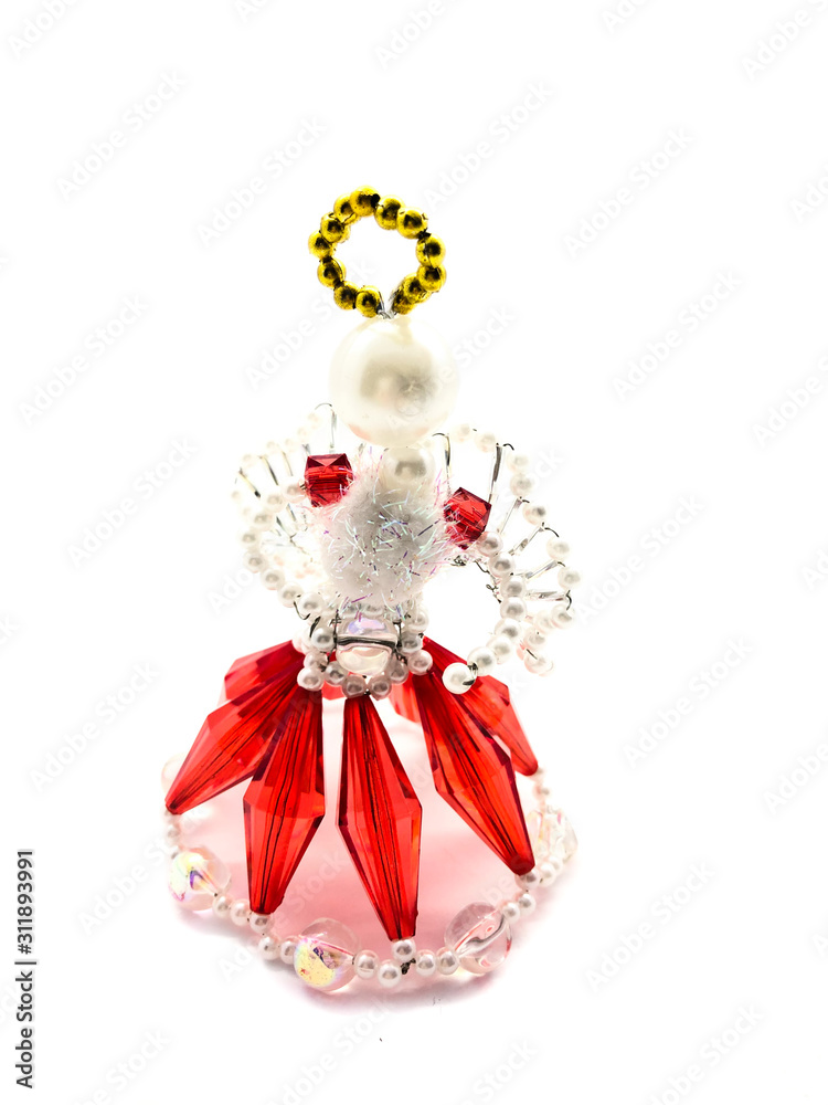Bead angel isolated on a white background. Handmade angel. Beadwork in the shape of an angel. Christmas angel. Angel.  Christmas angel. Valentine's day.