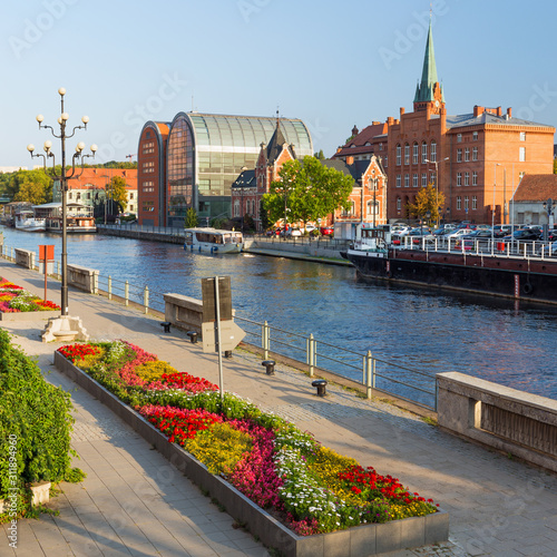 Sunny day on the Brda River. Waterfront view of the Bydgoszcz