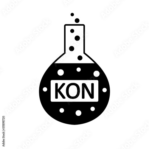 Laboratory glass with potassium hydroxide.