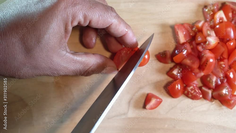 slicing grape tomatoes