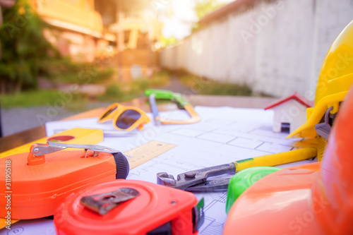 Wallpaper Mural Architect desk ,Business,engineering concept,construction site, soft focus, vintage tone, working with blueprints in the office Torontodigital.ca