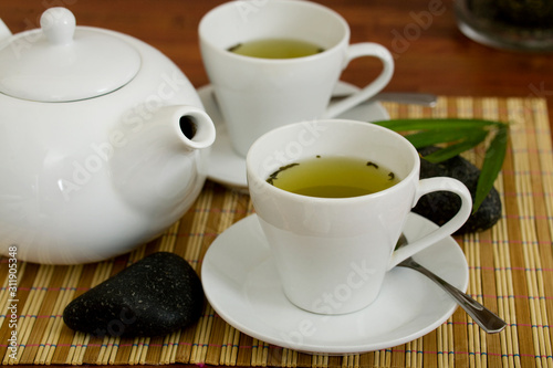 Two cups with green tea