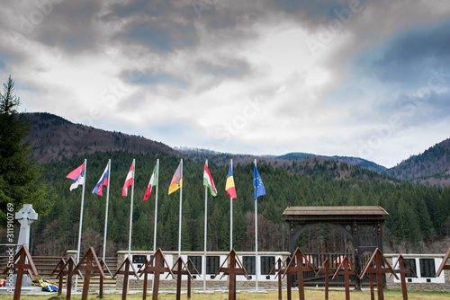 Waving european flags in local international World War 1 and 2 memorial park. photo