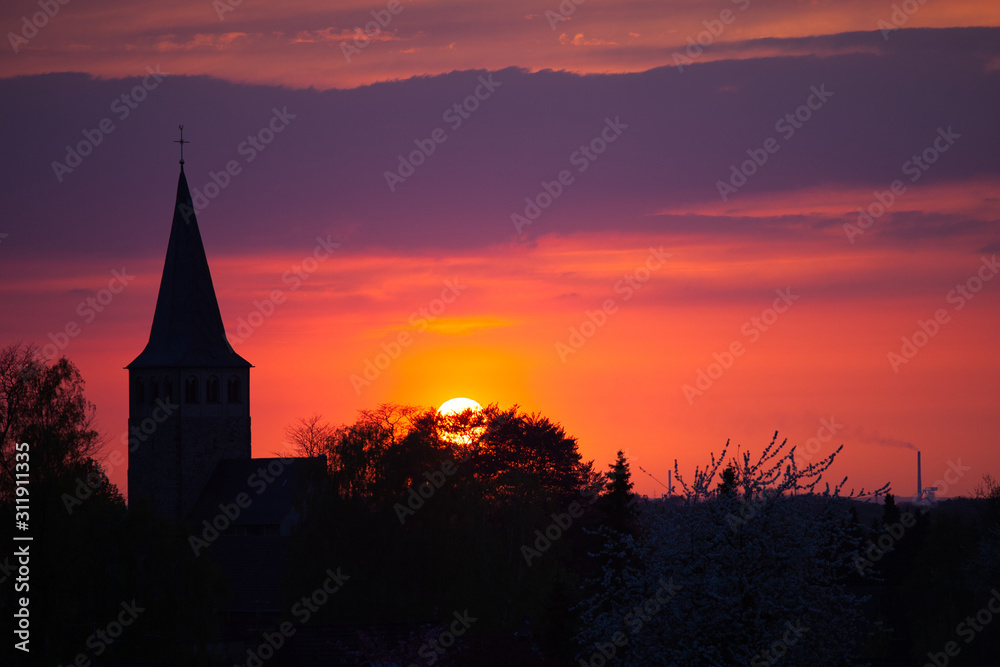 sunset with church of ratingen homberg