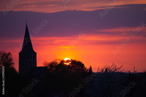 sunset with church of ratingen homberg © mschauer