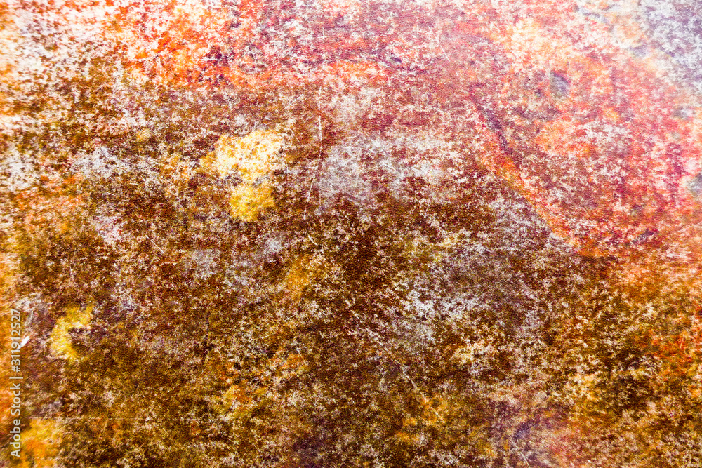 Detail shot of old rusty metal in orange tones Detail shot of old rusty metal in orange tones