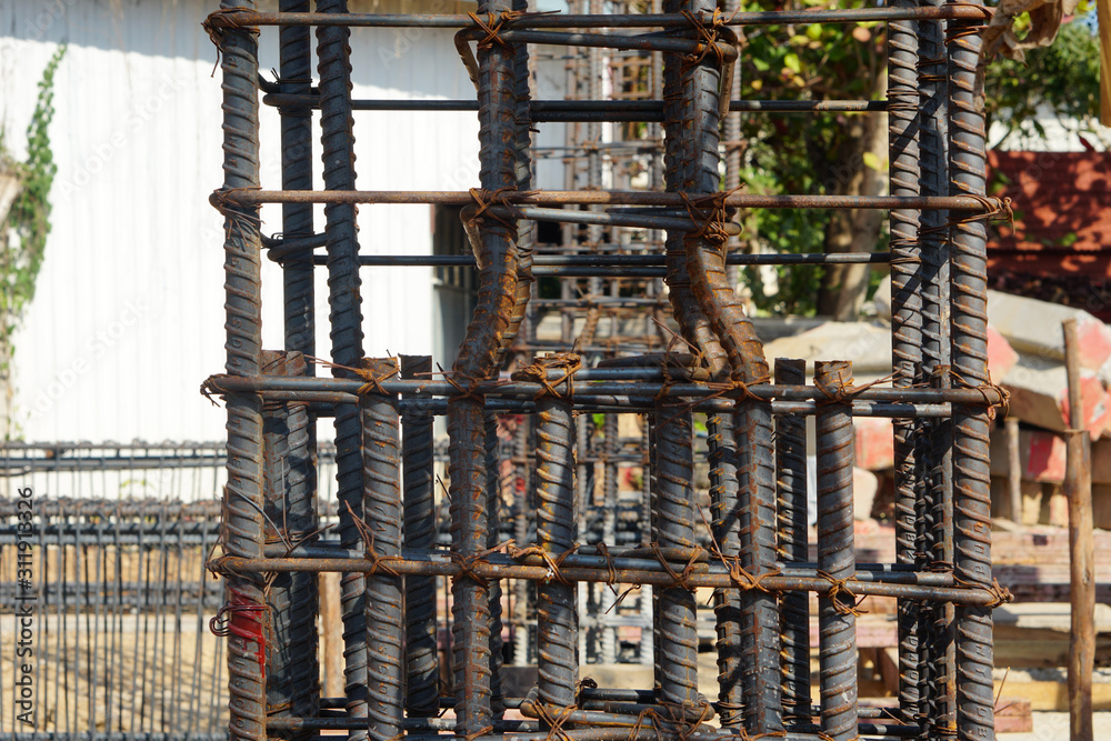 Structural form of steel reinforcement in concrete columns in the side view, Steel structure reinforcing the pole of high-rise buildings that are under construction.