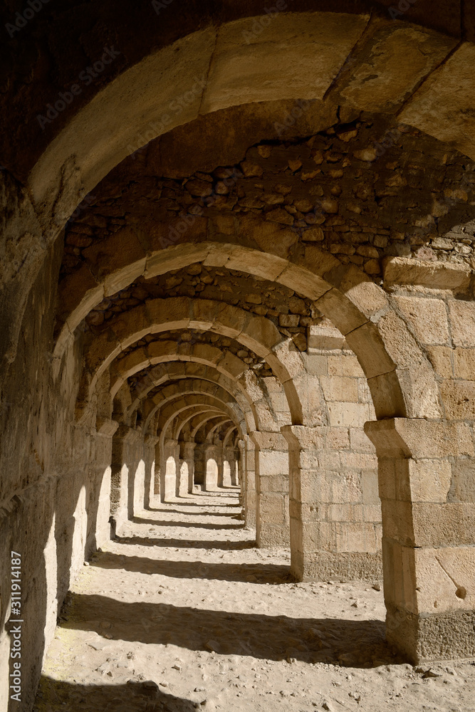 Receeding arches of the upper gallery of ancient Aspendos amphitheatre Turkey