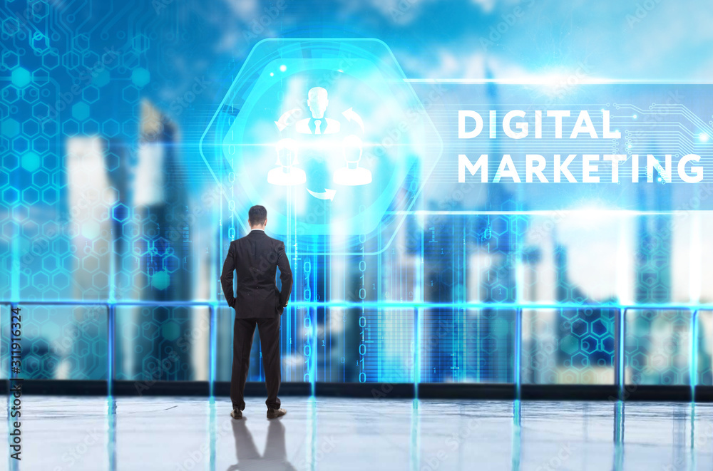 Business, Technology, Internet and network concept. Young businessman working on a virtual screen of the future and sees the inscription: Digital Marketing Business, Technology, Internet and network concept. Young businessman working on a virtual screen of the future and sees the inscription: Digital Marketing