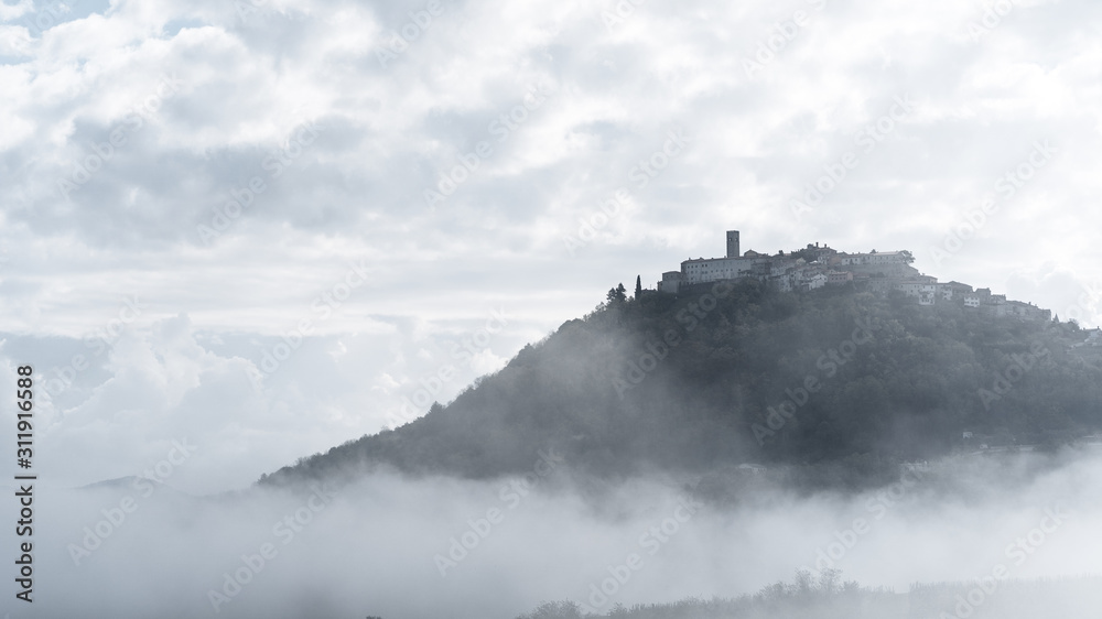The view of motovun in the haze of the morning (rural place in croatia, istria, europe)
