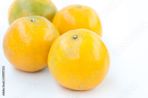 fresh oranges on white background