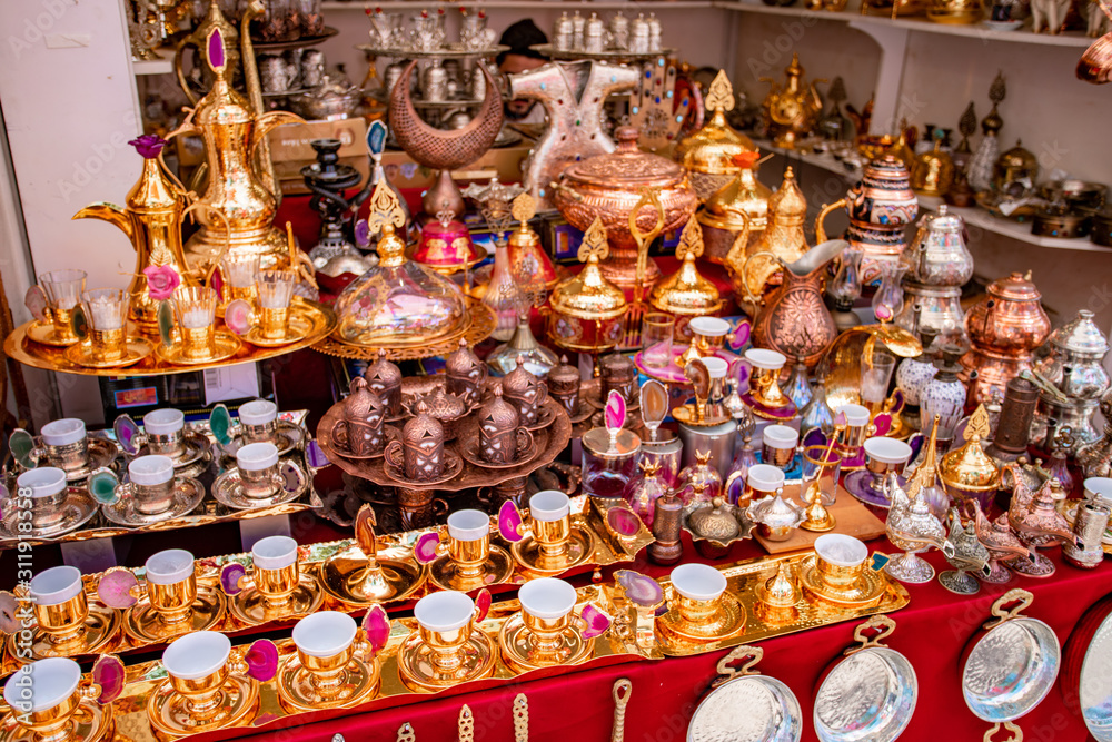Traditional handmade tea and coffee sets or teapots for sale at the bazar souvenir market in Istanbul, Turkey Traditional handmade tea and coffee sets or teapots for sale at the bazar souvenir market in Istanbul, Turkey