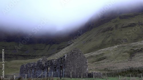 The derelict old school at Gleniff Horseshoe in County Sligo - Ireland photo