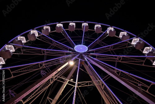 Christmas Ferris Wheel by Night in the City © FabriZiock