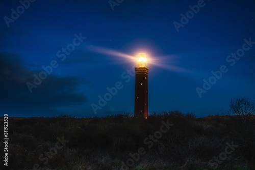lighthouse before sunrise