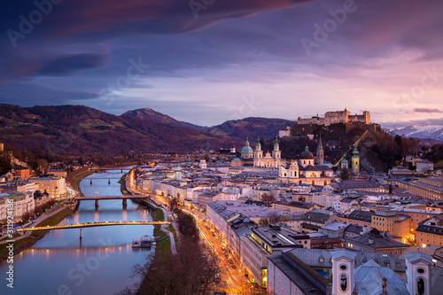 Salzburg, Austria. Cityscape image of the Salzburg, Austria with Salzburg Cathedral during beautiful winter sunset.