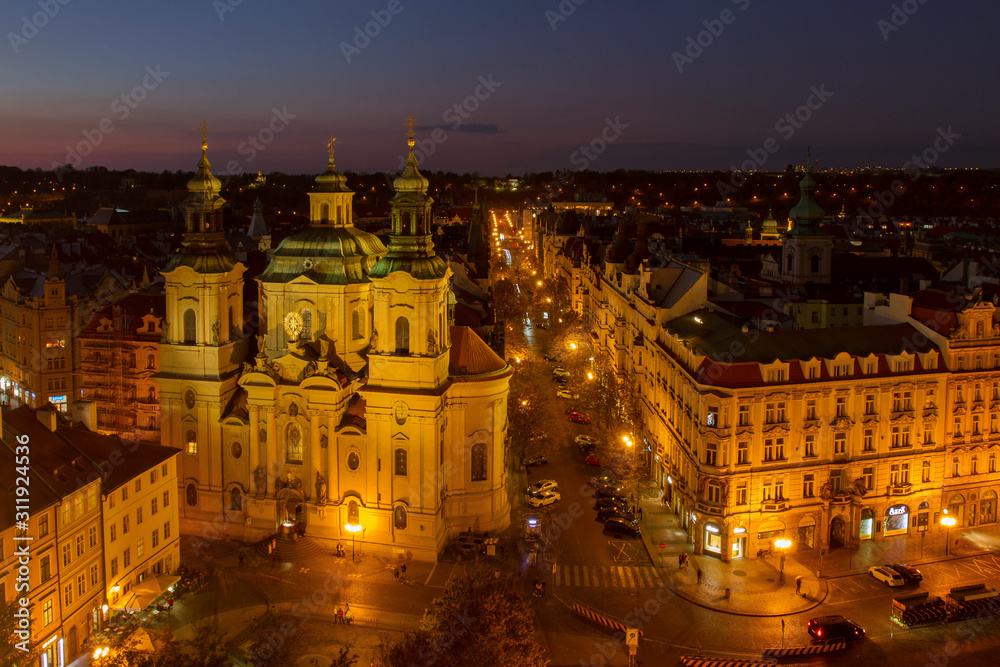 PRAGUE, CZECH REPUBLIC. On October 21, 2018. Aerial view of the Paris street in Prague and Old Town square. Night scene. Historical center .European travel. Aerial view of the gothic Tyn cathedral, Ol