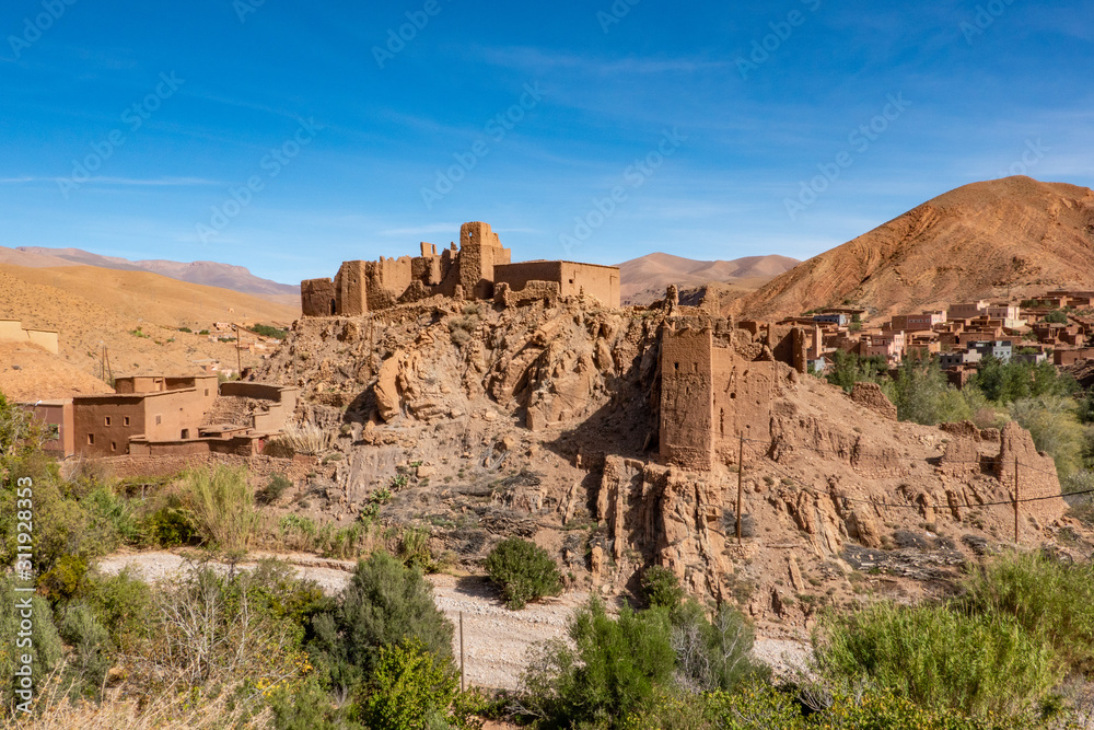 Morocco, Dades Valley, the ruin of a kasbah dominates the village of Imzzoudar, Morocco, Dades Valley, the ruin of a kasbah dominates the village of Imzzoudar,