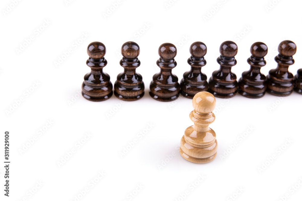 Single pawn against many enemies as a symbol of difficult unequal struggle Single pawn against many enemies as a symbol of difficult unequal struggle