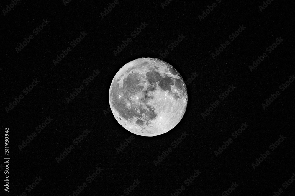 Fototapeta premium The moon in the starry sky. Moon close up. Macro
