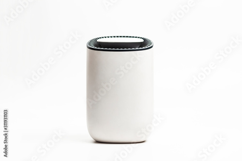 close up of portable dehumidifier device isolated photo