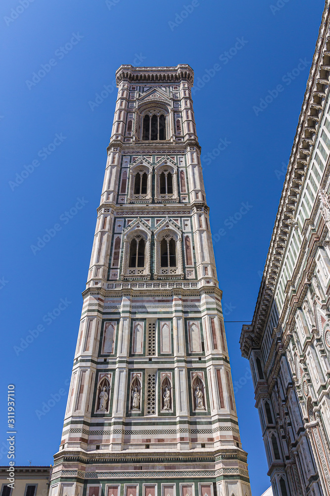 Florence, Italy - 08.27.2017:Florence, Italy - 08.27.2017: Tower of Giotto's Campanile bell tower of the Basilica di Santa Maria del Fiore