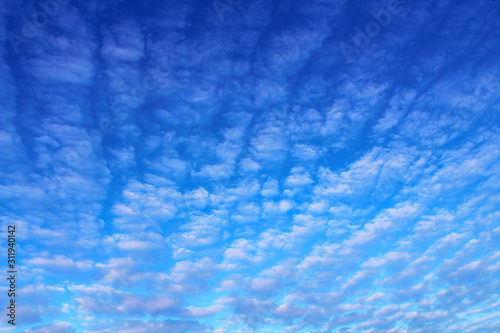 Beautiful blue sky and white cirrus clouds. Background. Scenery.