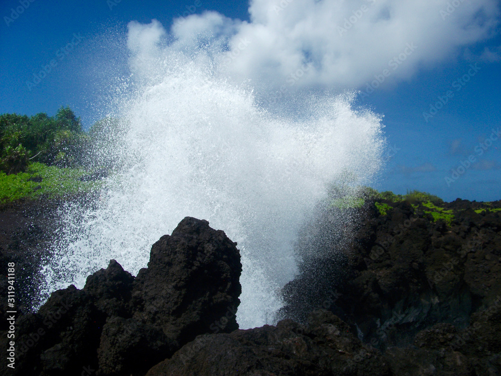Fototapeta premium Blow hole in Waianapanapa State Park, Hana, Maui