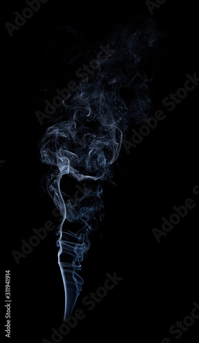 Photo of real white smoke on black background