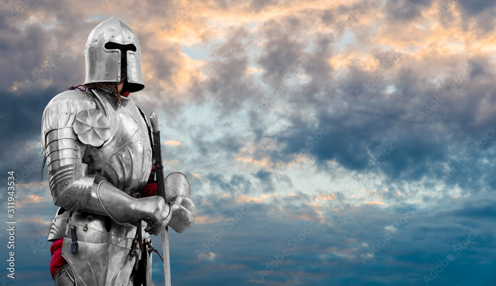 Knight in shiny metal armor. Reliable security and insurance. Copy space. Knight in shiny metal armor. Reliable security and insurance. Copy space.