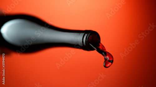 Detail of pouring red wine
