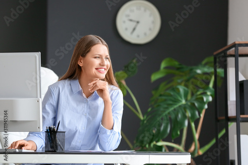 Beautiful young businesswom...