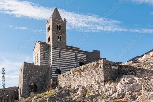 View of Portovenere  Italy  St. Peter church  a roman chatolic church built on a cliff overlooking the sea in the Cinque Terre national park