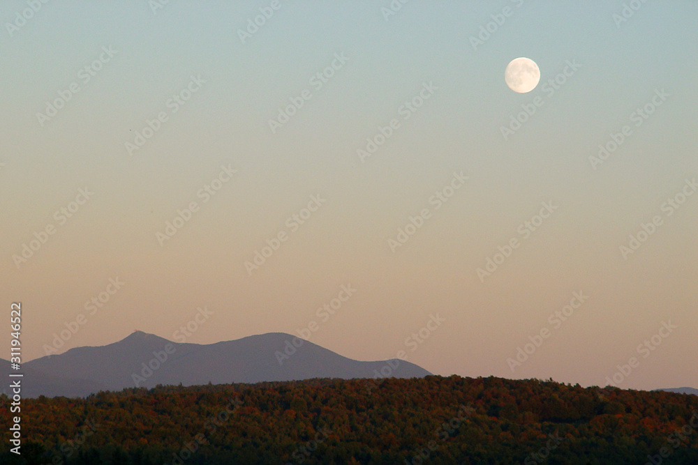 Jay Peak and a full moon in Vermont Jay Peak and a full moon in Vermont