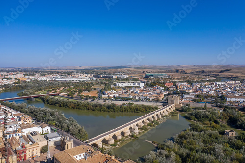 Aerial view of the old city of Cordoba and Romano Bridge. Spain