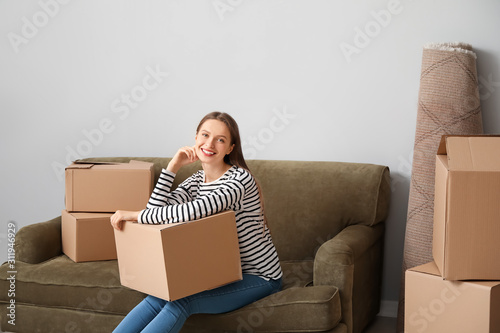 Happy young woman with movi...
